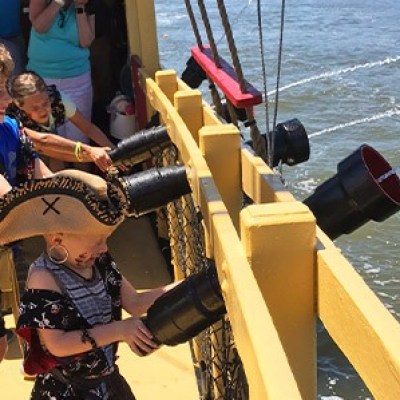a group of people on a boat in the water